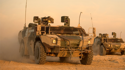 JFST FENNEK wheeled armoured vehicle in the desert